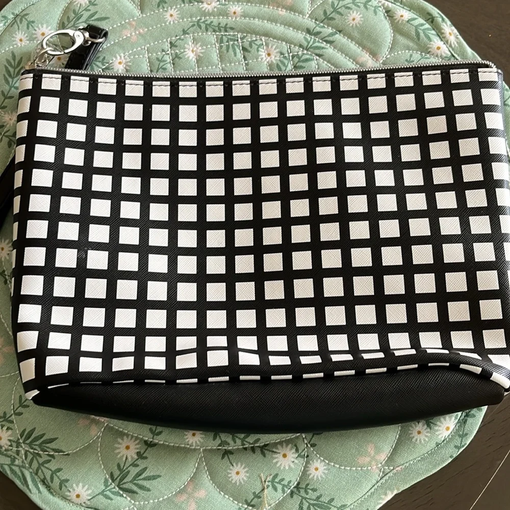Dabney Lee black/white cosmetic bag/wristlet.
